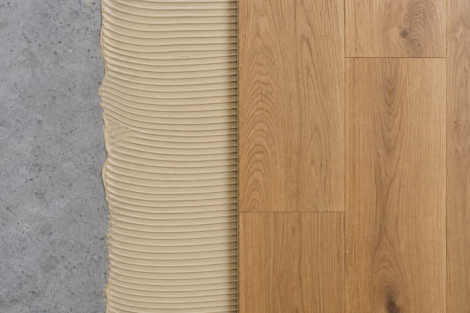 Glue-down engineered hardwood with adhesive on a concrete slab and oak planks laid in